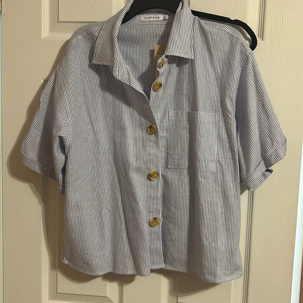 NWT blue and white vertical striped blouse.